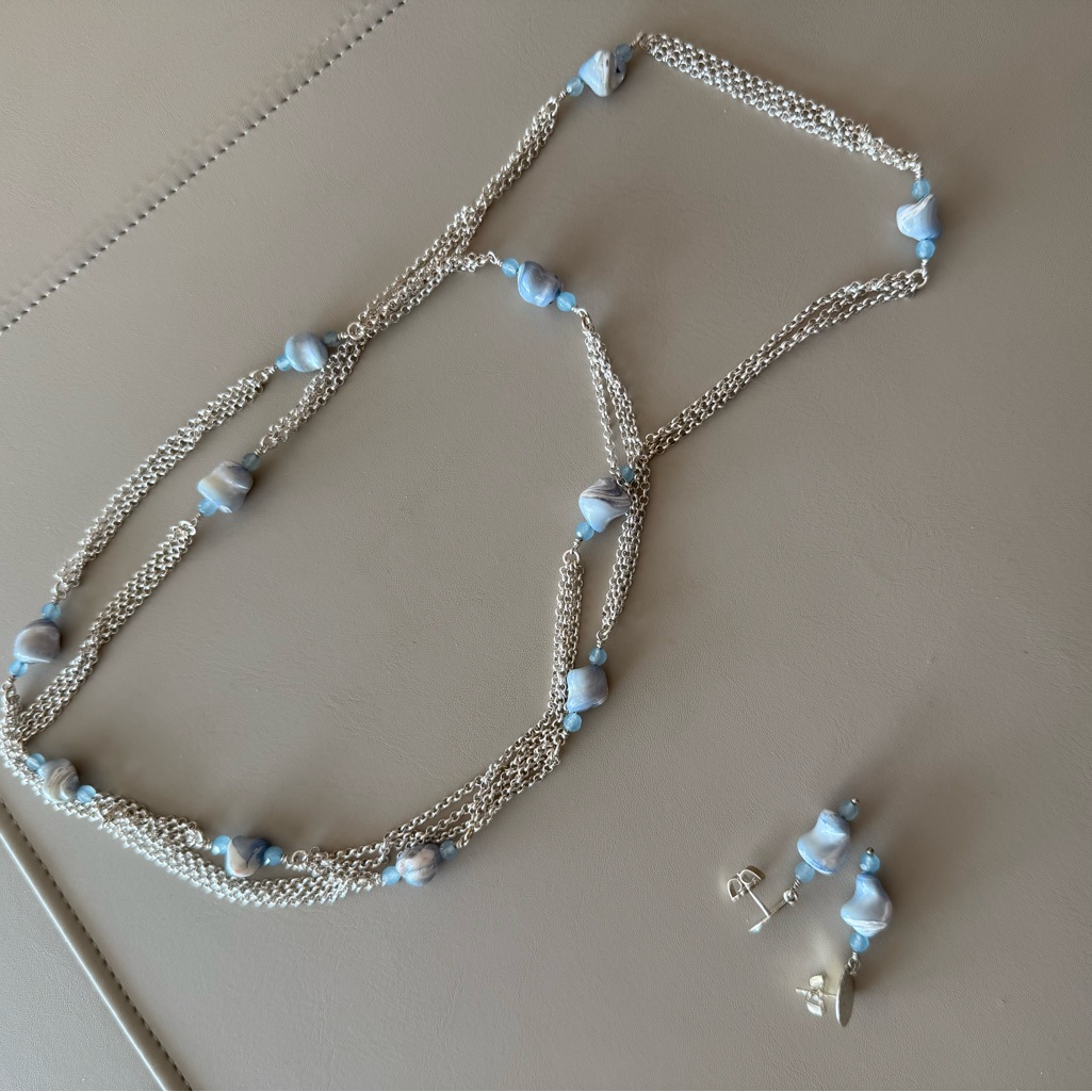 Silver Multi-Strand Necklace And Earring Set With Light Blue Beads -